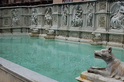 The Fonte Gaia, Piazza del Campo, Siena, Italy by Jacopo della Quercia (1419) (replaced by a copy in 1868)