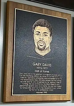 Gary Davis, whose Cal Poly Hall of Fame plaque is shown in 2023, set numerous Mustang rushing records in the 1970s before going on to play four years for Don Shula's Miami Dolphins in the NFL.