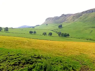 Gask Hill shown as an escarpment beyond grazing fields