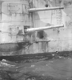 Casemate guns on HMS&nbsp;Kent showing shell damage from the Battle of the Falkland Islands