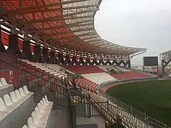 An electronic scoreboard is included.