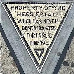 Detail of the triangle, which contains the text "Property of the Hess Estate which has never been dedicated for public purposes."