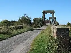 Approached via Bridge Lane from the east
