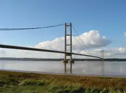 A long suspension bridge over a large expanse of water