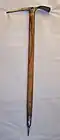 A wooden handled ice axe from the mid-1970s Length: 75&nbsp;cm (29+1⁄2&nbsp;in) Weight: 840&nbsp;g (29+1⁄2&nbsp;oz)
