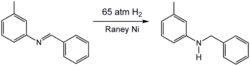 Hydrogenation of an imine using a Raney nickel catalyst, a popular heterogeneous catalyst.