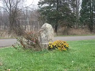 Monument on Bertrand Road at the Indiana–Michigan border