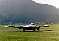 Venom aircraft taxiing at Interlaken air base in October 1983