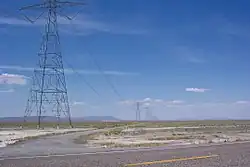 Path 27 as seen on U.S. Route 50 in Utah. An AC transmission line has since been built alongside this segment of the HVDC line.