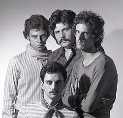 Invisible ca. 1976, in its final lineup. From left to right: top: Tomás Gubitsch, Machi Rufino and Luis Alberto Spinetta; Bottom: Pomo Lorenzo.