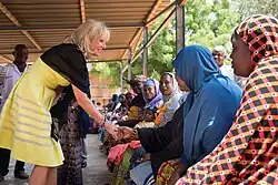Jill Biden shakes hands with some women