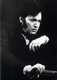 black and white photograph of white man, clean shaven in 19th century costume, looking pensive