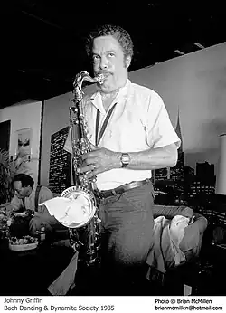 Johnny Griffin with a towel in his tenor saxophone's bell