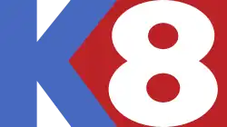 A blue K next to a red pentagon shape containing a white numeral 8