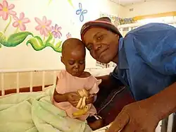 A mother and child at Karanda