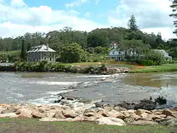 Mission House is situated where the Kerikeri River (right) meets the Kerikeri Inlet. The stone store bridge was located for decades where the ford can be seen; it was removed in late 2008.