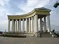 A semicircular colonnade overlooking the Odesa seaport from a cliff