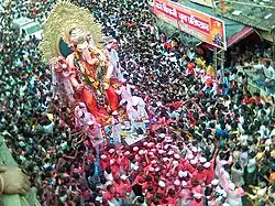 Procession of the famous "Lalbaug cha Raja" Ganesha idol during the Ganesh Chaturthi festival in Mumbai, Maharashtra