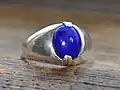 20th century silver ring with polished lapis oval; 2&nbsp;cm ×&nbsp;2.4&nbsp;cm ×&nbsp;1&nbsp;cm (0.79&nbsp;in ×&nbsp;0.94&nbsp;in ×&nbsp;0.39&nbsp;in)