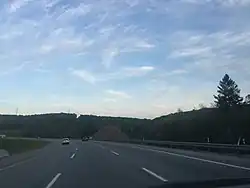 Five lanes, with three in one direction