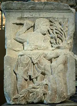 The Celtic god Esus felling a tree on the Pillar of the Boatmen
