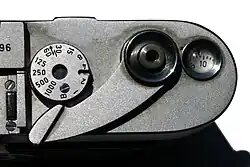The Leica M3 shutter speed dial, film advance lever, shutter button and the frame counter.