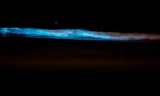 Surf glowing blue in Southern California