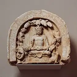 Niche with the seated Boddhisatva Shakyamuni, Tapa-i Kafariha. Metropolitan Museum of Art.[18]