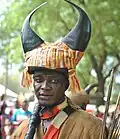 Man in horned helmet, Ghana