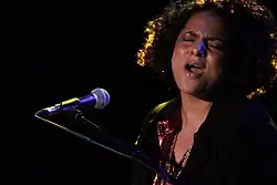 A Black British woman.