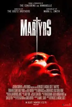 A young woman bathed in red looks upward. The film's title "MARTYRS" has it's "T" stretched down and stylized with a sharp end point that reaches close to the woman's eye.