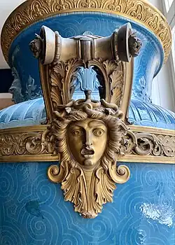 Neoclassical Medusa mascaron with acanthuses on a handle of the Mayeux Vase, by the Sèvres Porcelain Manufactory, 1878, hard-paste porcelain, gilded copper molding on the collar, and gilded bronze handles, Louvre