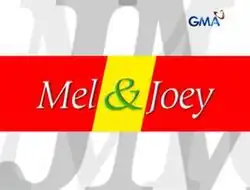 An image with big letters over a white background. The show title is displayed on the center of the image, over a red and yellow line bar. The logo of GMA Network is displayed on the upper right side of the image.