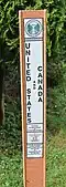 Modern boundary marker on the 49th parallel north designating the border between the United States and Canada.