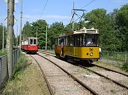 Rotterdam motor car 507 passes a Vienna tram at the substitution at Amstelveen Station.