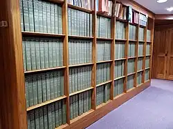 Bookshelves holding 280 volumes of the National Union Catalog (NUC)