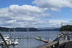 The twin-span complex seen from the boat dock near the Tacoma/University Place city border; 2023