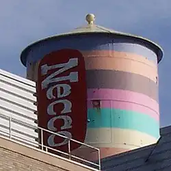 The water tower of the Necco facility on Massachusetts Avenue in Cambridge, Massachusetts, painted in 1996 to resemble a roll of Necco Wafers[3]