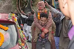 Image 3Procession of Nepali Hindu Wedding; Groom being carried by a bride brother or relatives (from Culture of Nepal)