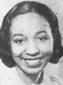 A young African-American woman, smiling