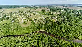 New Amsterdam to the right and the Town of Holland is to the left