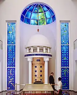 The stained-glass windows and dome flanking the Torah ark of the Holocaust Memorial Synagogue, Darmstadt, designed by artist Brian Clarke