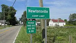 Newtonsville corporation limit sign.