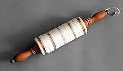 A small porcelain rolling pin from Germany