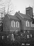 Rear of the church in a 1935 photo from the Historic American Buildings Survey
