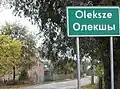 Polish and Belarusian bilingual place-name sign in Oleksze