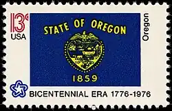 The Oregon state flag as depicted in the 1976 bicentennial postage stamp series.