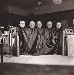 OTMA sisters and Alexei (center) in spring 1917, after having lost their hair due to measles.