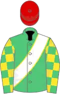 Emerald green, white sash with yellow piping, emerald green and yellow check sleeves, red cap