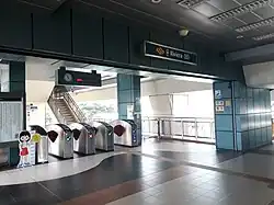 View of the concourse with faregates separating the paid and unpaid areas.